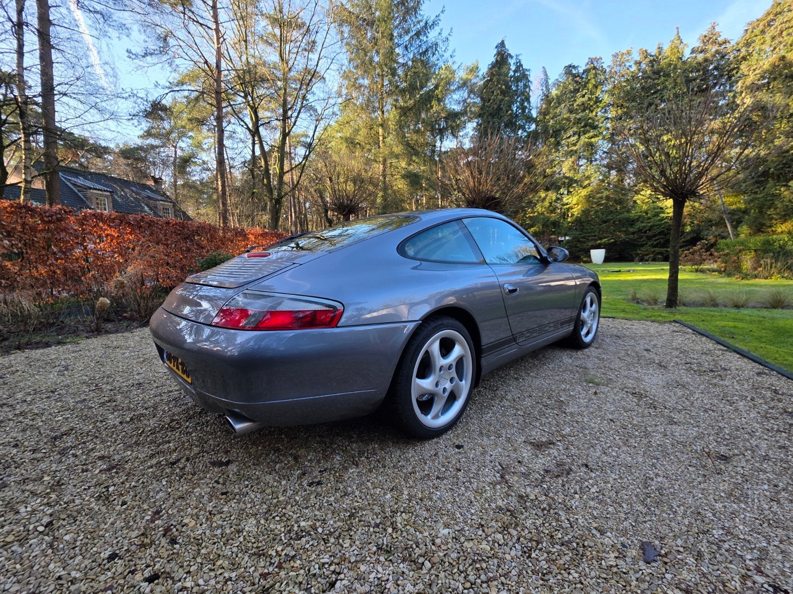 Porsche 911 3.4 996/2 Carrera 4 tiptronic AUT 2001 Grijs, Auto's, Automaat, Zwart, 4 stoelen, Leder