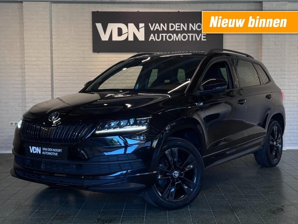 Skoda KAROQ 1.5 TSI Sportline Business Stoel- stuurverw Navi, 4 cilinders, Zwart, Karoq, Bedrijf