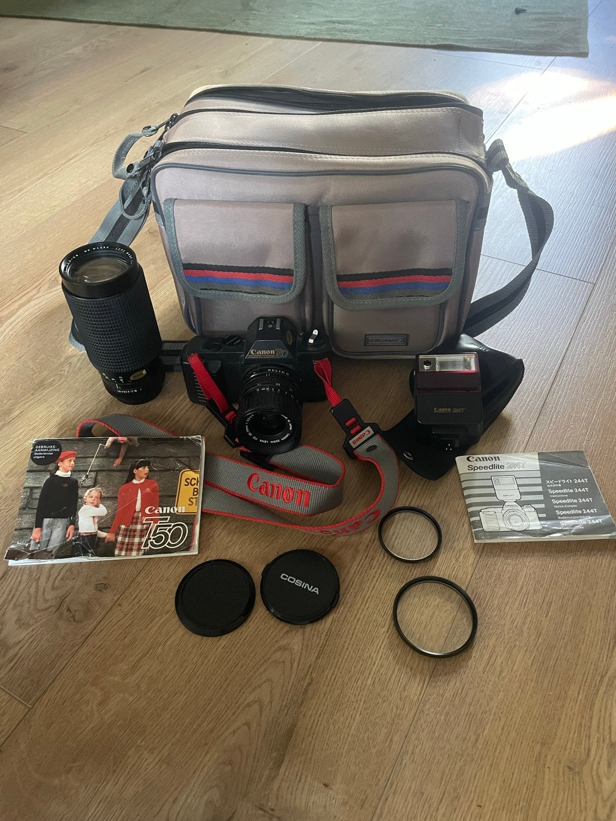 Canon T50 Spiegelreflexcamera met 2 lenzen en flitser, Audio, Tv en Foto, Fotocamera's Analoog, Ophalen of Verzenden, Gebruikt