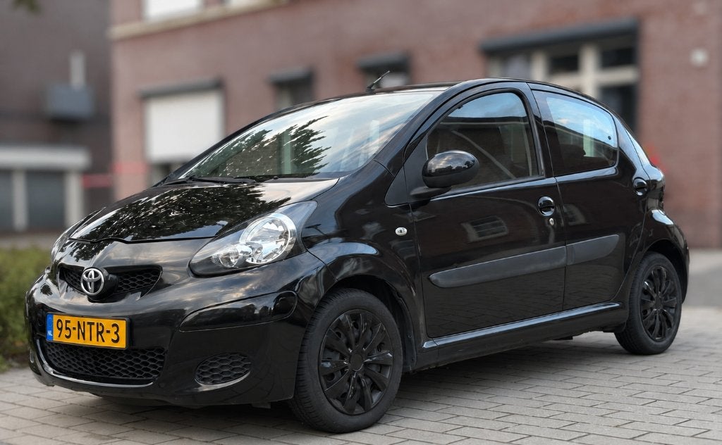 Toyota Aygo 1.0 12V Vvt-i 5DRS MMT 2010 Zwart, Parkeersensor, Stof, 4 stoelen, Origineel Nederlands
