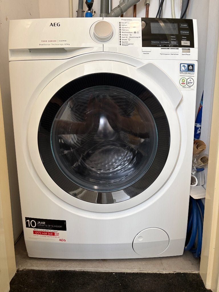 AEG Was-droogcombinatie (L7WBN84GW), 8 tot 10 kg, Ophalen, Zo goed als nieuw, Minder dan 85 cm