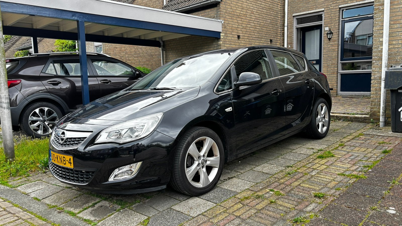 Opel Astra 1.6 16V 5D 2010 Zwart, Auto's, Opel, Voorwielaandrijving, Stof, 1250 kg, 4 cilinders