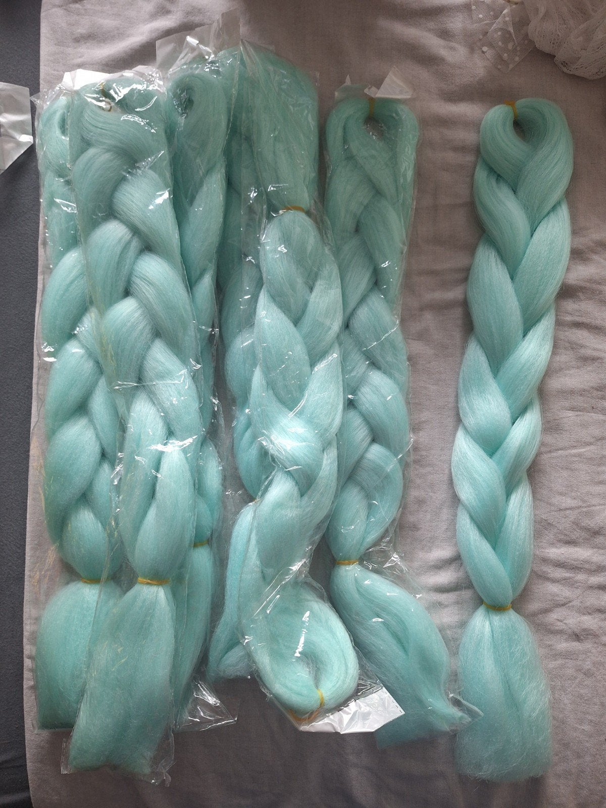 7x mintgroen kanekalon nephaar, Sieraden, Tassen en Uiterlijk, Ophalen of Verzenden, Nieuw, Pruik of Haarverlenging