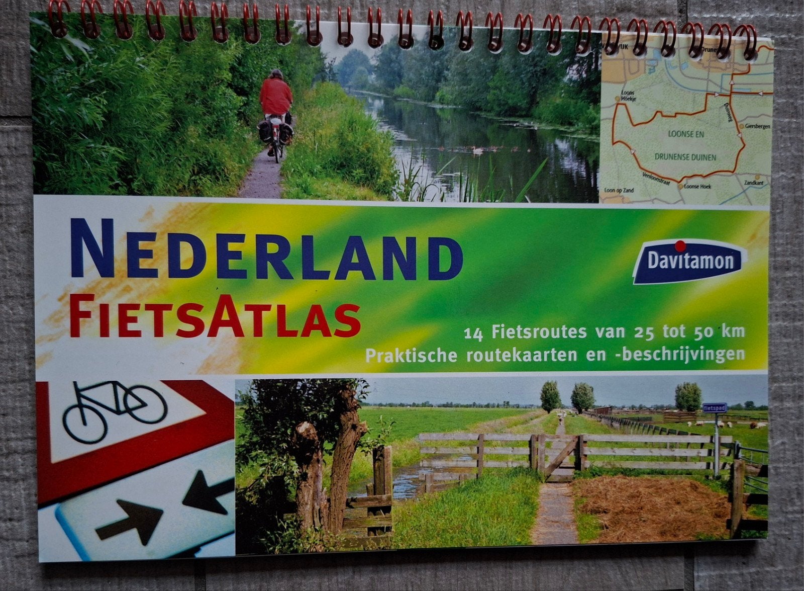 Nederland Fietsatlas - 14 fietsroutes van 25 tot 50 km, Overige atlassen, 2000 tot heden, Ophalen of Verzenden, Zo goed als nieuw
