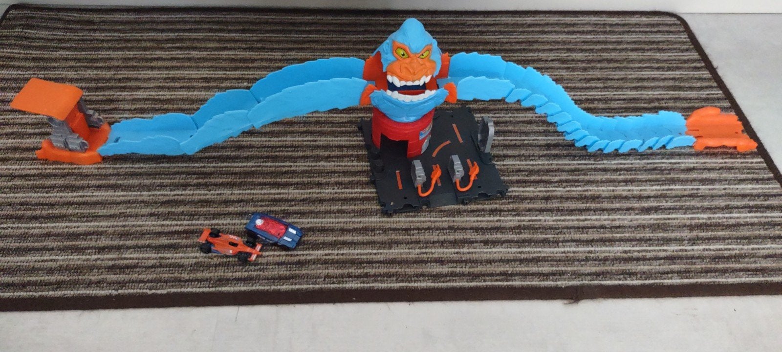 Hot Wheels gorilla baan met  2 autos, Kinderen en Baby's, Speelgoed | Racebanen, Ophalen of Verzenden, Zo goed als nieuw, Handmatig