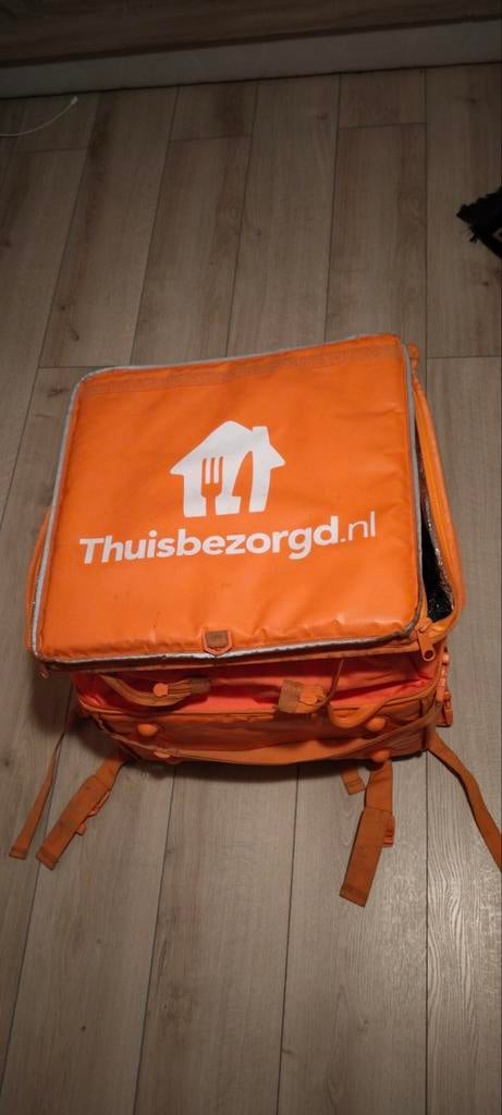 Thuisbezorgd rugtas, Ophalen