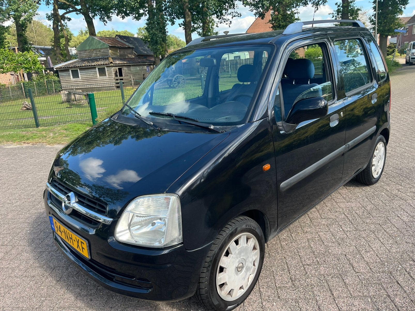 Opel Agila 1.2 I 16V 2003 Zwart apk 30/6/2027, Auto's, Voorwielaandrijving, Stof, Metallic lak, Zwart