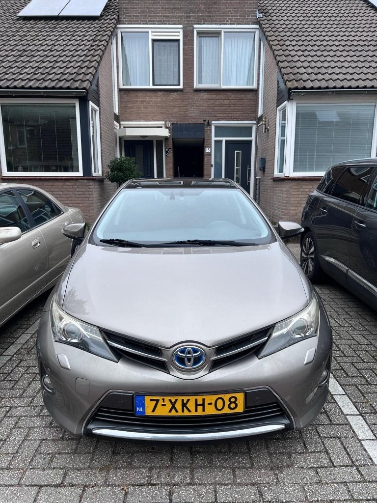 Toyota Auris 1.8 Hybrid Lease+ 2014 model Keyless Panaromic, Auto's, Euro 5, Zwart, Metallic lak, Bruin