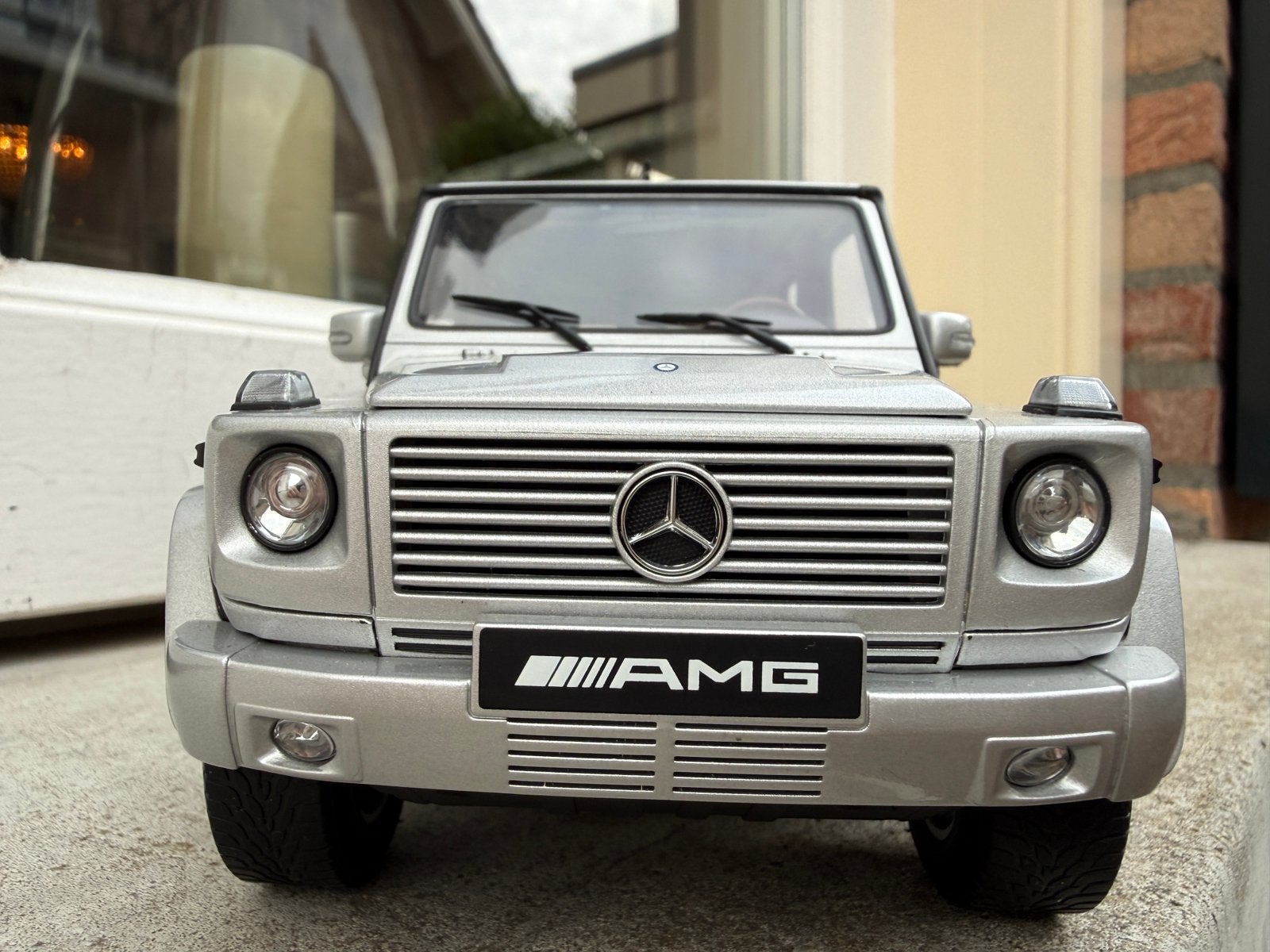 1:18 Mercedes G-Klasse G55 AMG zilver 2009 Autoart 76247, Hobby en Vrije tijd, Modelauto's | 1:18, Auto, Autoart, Ophalen of Verzenden