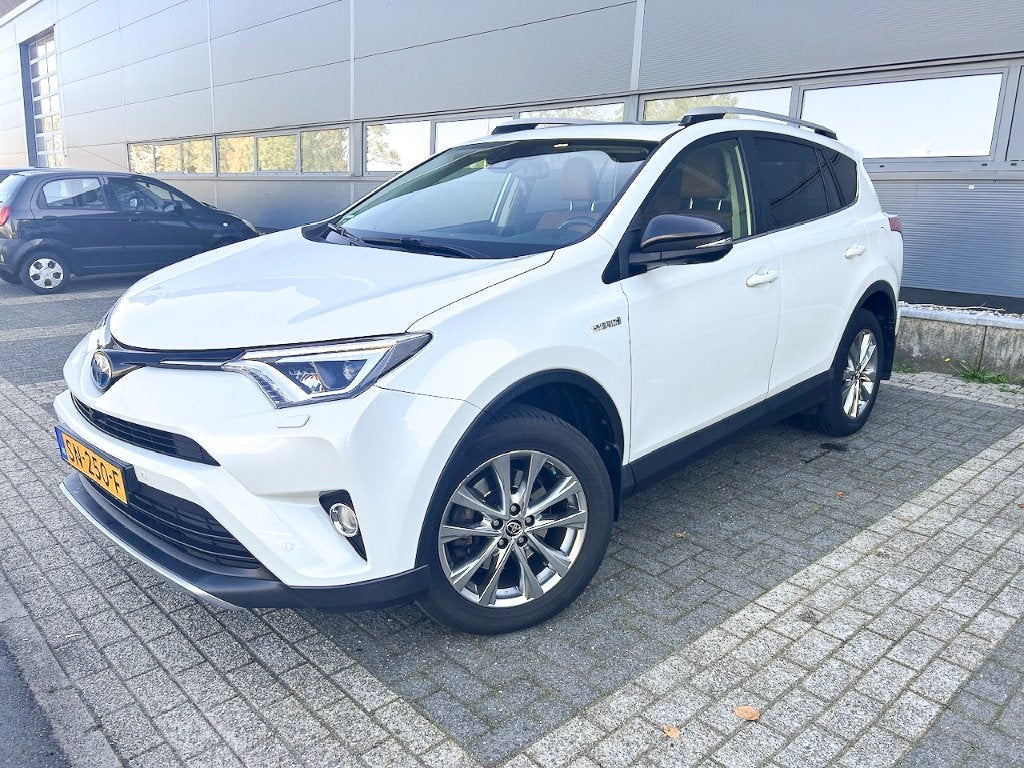 Toyota Rav4 2.5 Vvt-i Hybrid 155pk AWD Aut 2017 Wit, Auto's, Automaat, 1650 kg, Wit, Leder