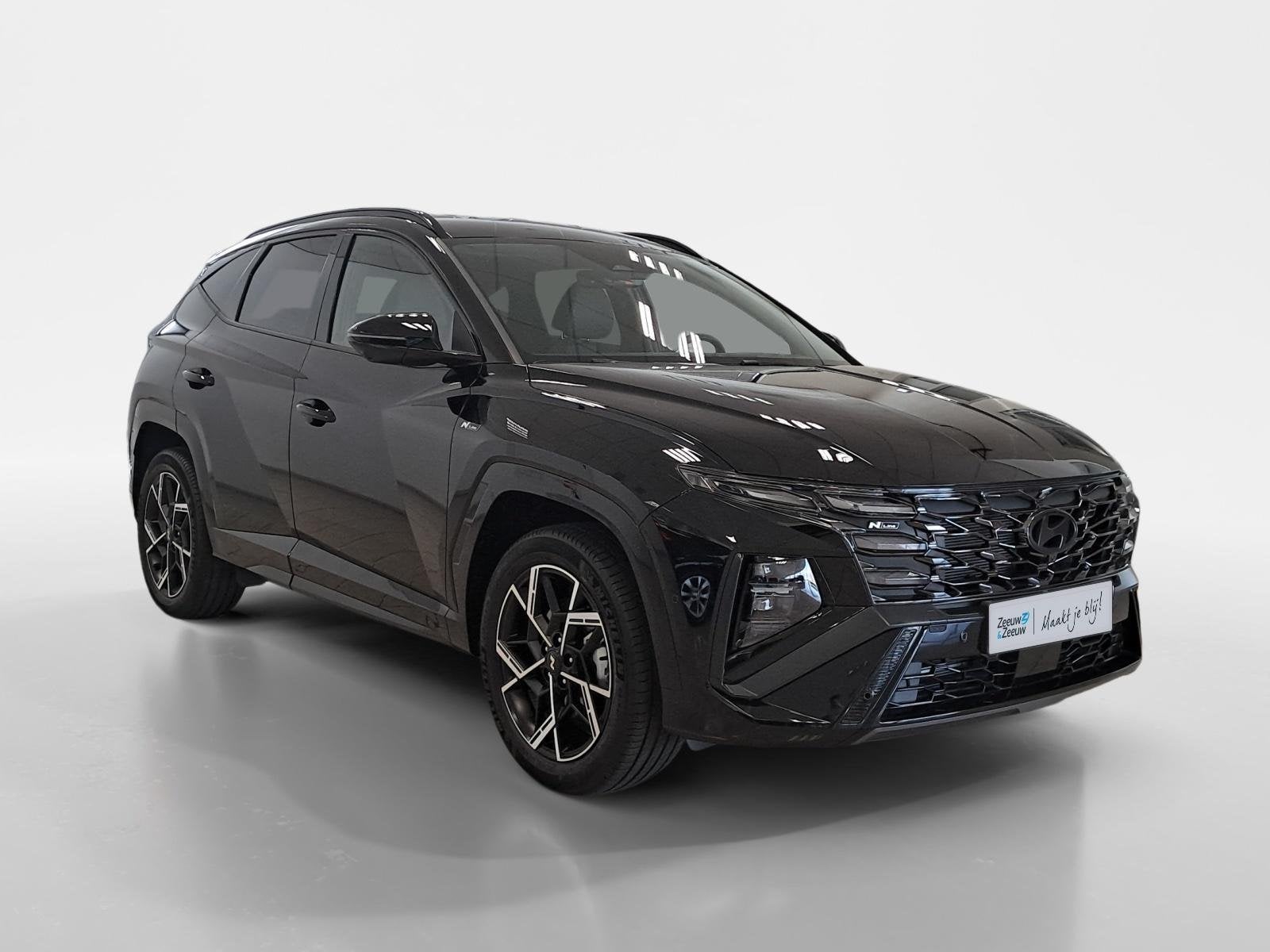 Hyundai Tucson 1.6 T-GDI PHEV N Line | All weather banden |, Auto's, 14 kWh, 4 cilinders, Zwart, Bedrijf