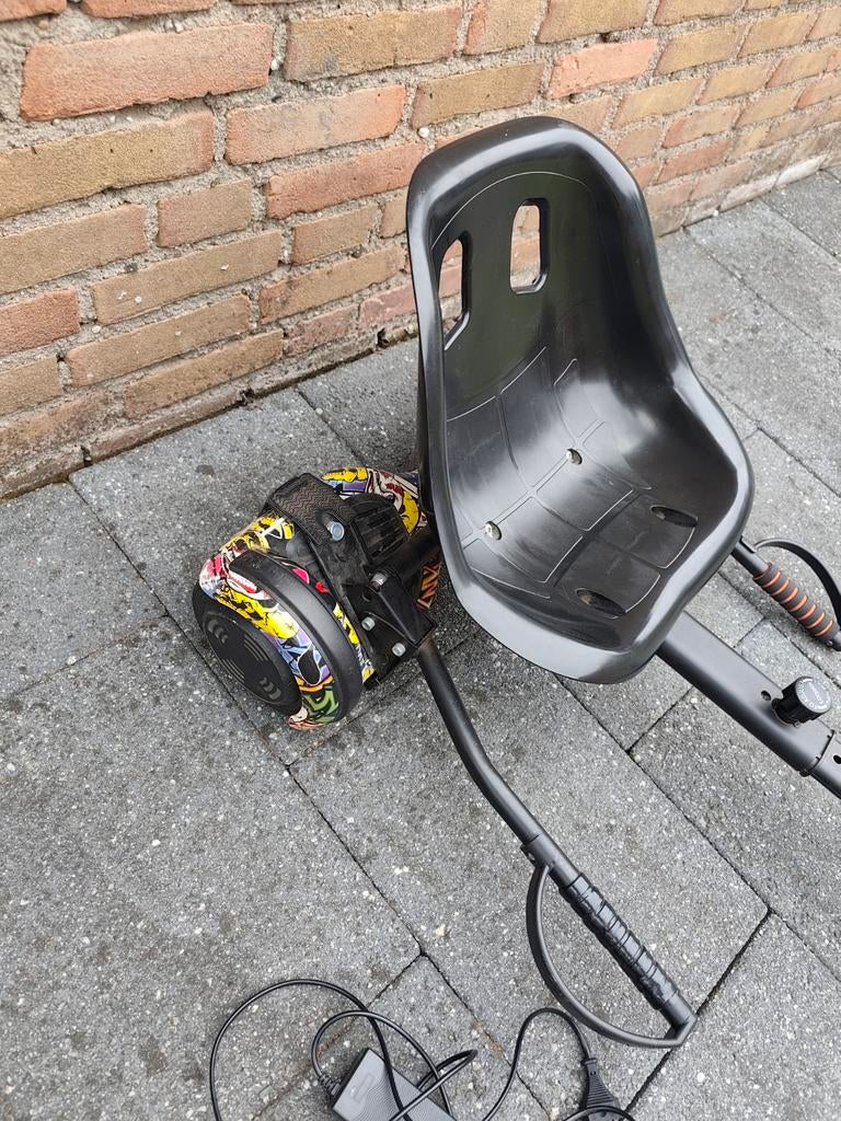 Hoverboard met zitje en Bluetooth speaker, Ophalen of Verzenden, Gebruikt