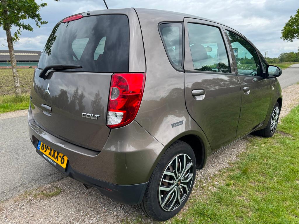 Mitsubishi Colt 1.1 Edition One top onderhouden, Euro 5, Stof, Gebruikt, Metallic lak