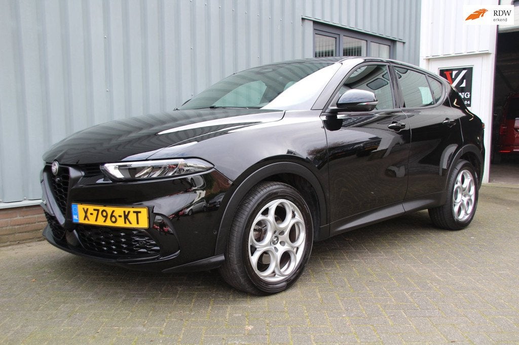 Alfa Romeo TONALE 1.5T Hybrid 130 PK AUTOMAAT Sprint, Auto's, Alfa Romeo, Stof, Gebruikt, 4 cilinders, 700 kg