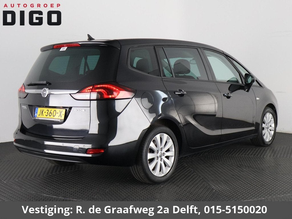 Opel Zafira Tourer 1.4 Cosmo 7p. 7-zitplaatsen | Navigatie |, Auto's, Opel, Euro 5, Stof, Gebruikt, Zwart