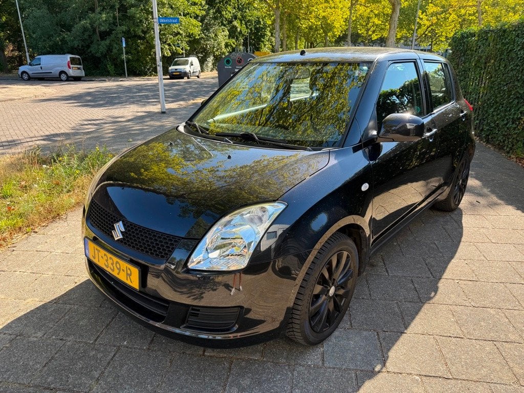 Suzuki Swift 1.3 Comfort Airco Nieuwe Koppeling 5Deurs Isofi, Auto's, Voorwielaandrijving, Stof, Zwart, 400 kg