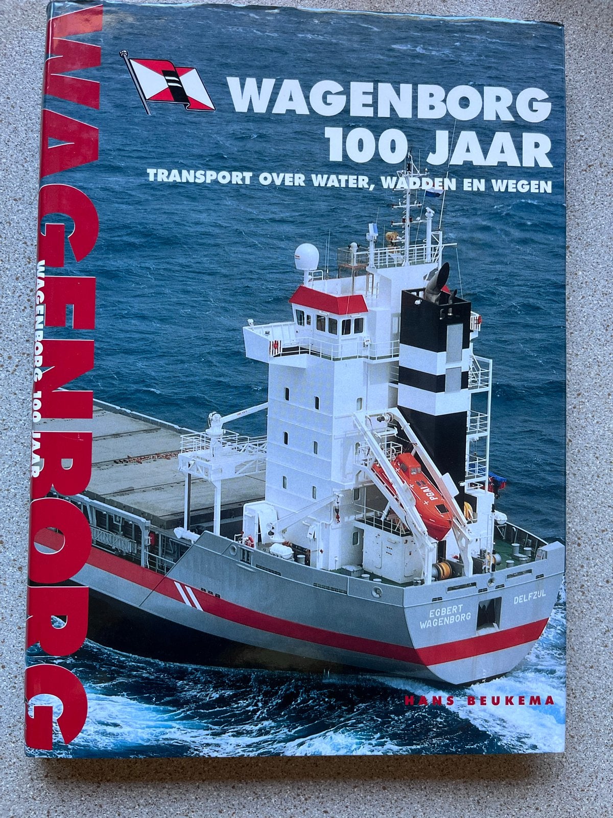 Wagenborg 100 Jaar: Transport over water, wadden en wegen, Ophalen of Verzenden, Gelezen, Boot