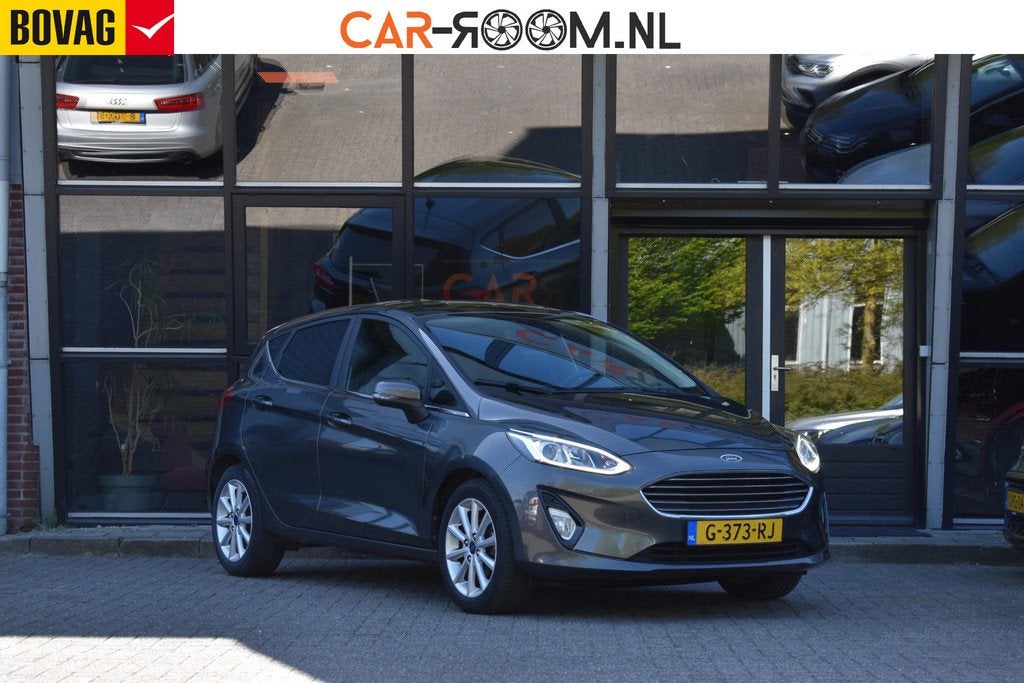Ford Fiesta 1.0 EcoBoost Titanium Cruise Lane Keyless Led, Voorwielaandrijving, Gebruikt, 580 kg, Met garantie (alle)