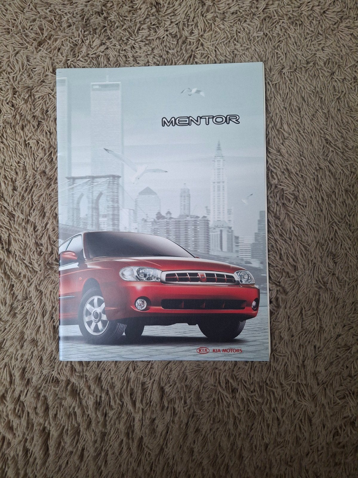 Autofolder Kia Mentor, Verzenden, Overige merken