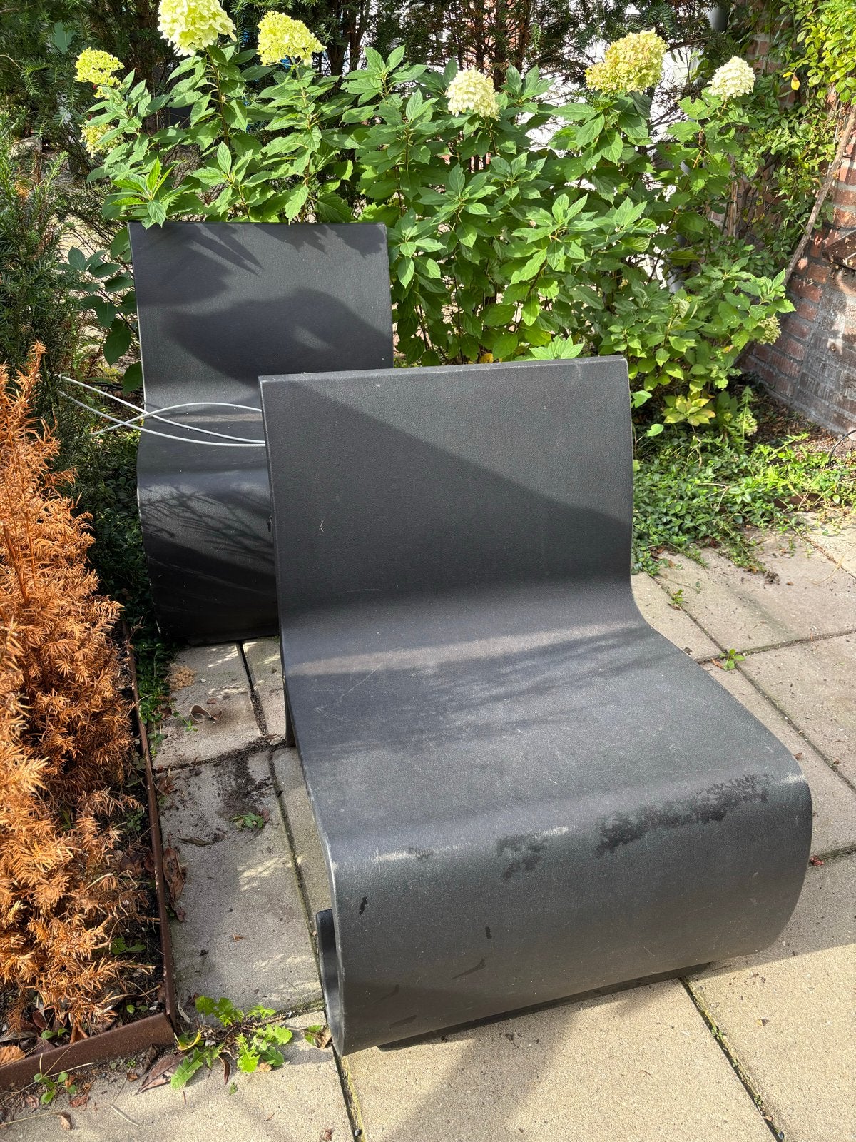 2 zwarte design tuinstoelen kunststof, Tuin en Terras, Ophalen, Gebruikt, Kunststof