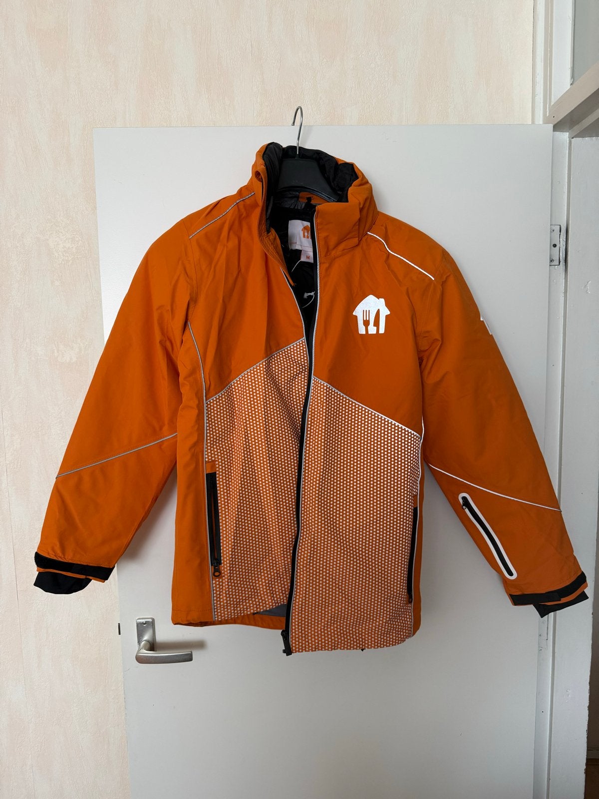 Thuisbezorgd jas - Maat M - Nieuw ongedragen, Verzenden, Nieuw, Maat 48/50 (M), Oranje