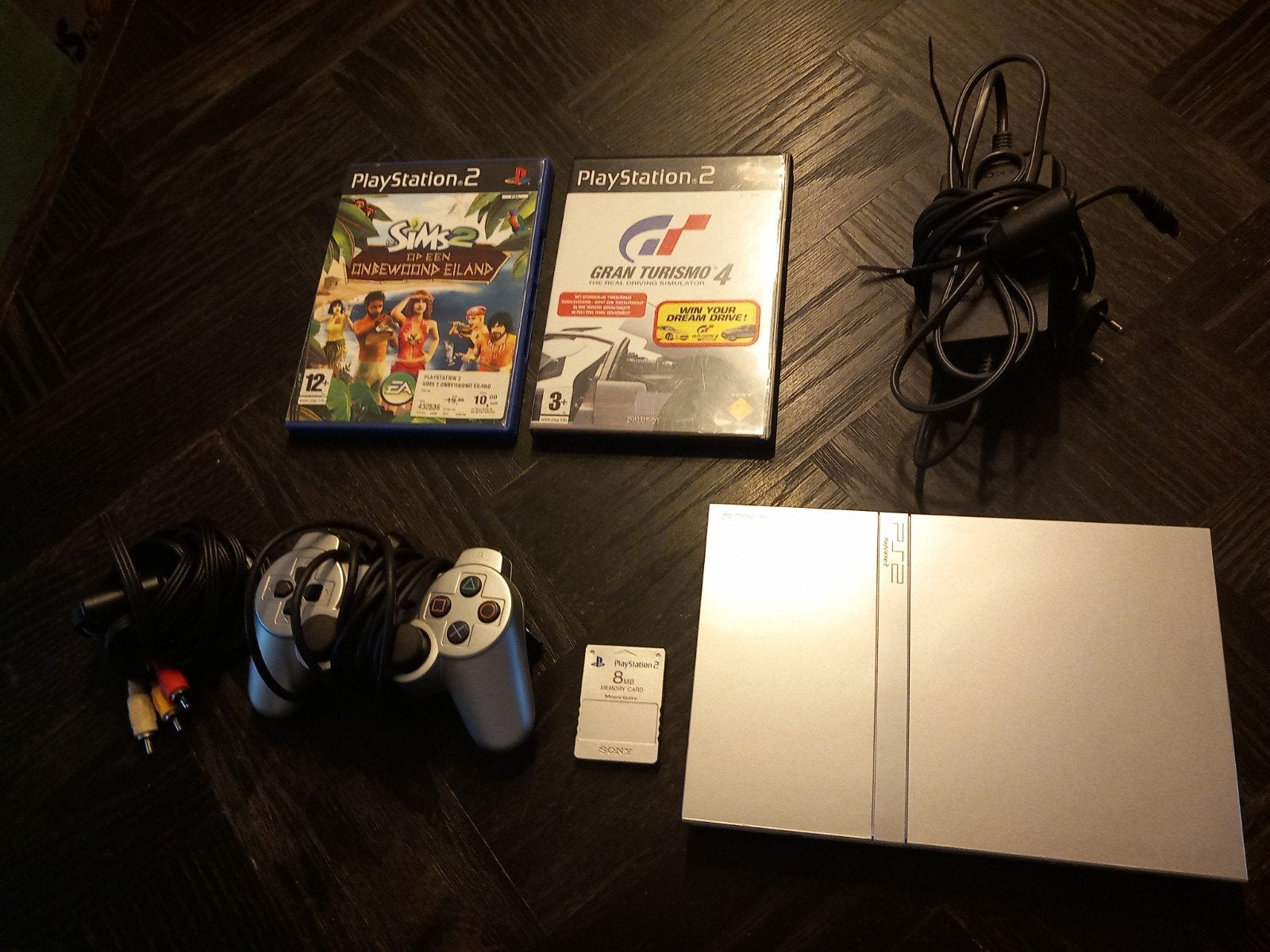 PlayStation 2 Slim zilver met 2 games, controller en geheuge, Gebruikt, Eén computer, Ophalen of Verzenden, Sony Interactive Entertainment