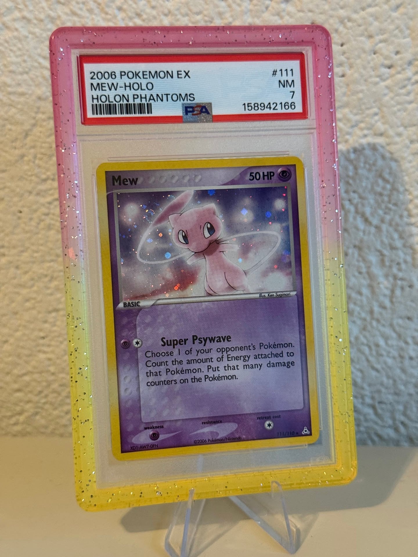Pokemon | Mew | PSA 7 | 111/110 | 158942166, Ophalen of Verzenden, Zo goed als nieuw, Losse kaart