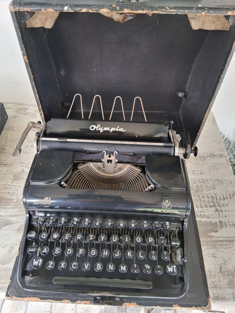 Antieke olympia progess typemachine 1930/1940, Ophalen
