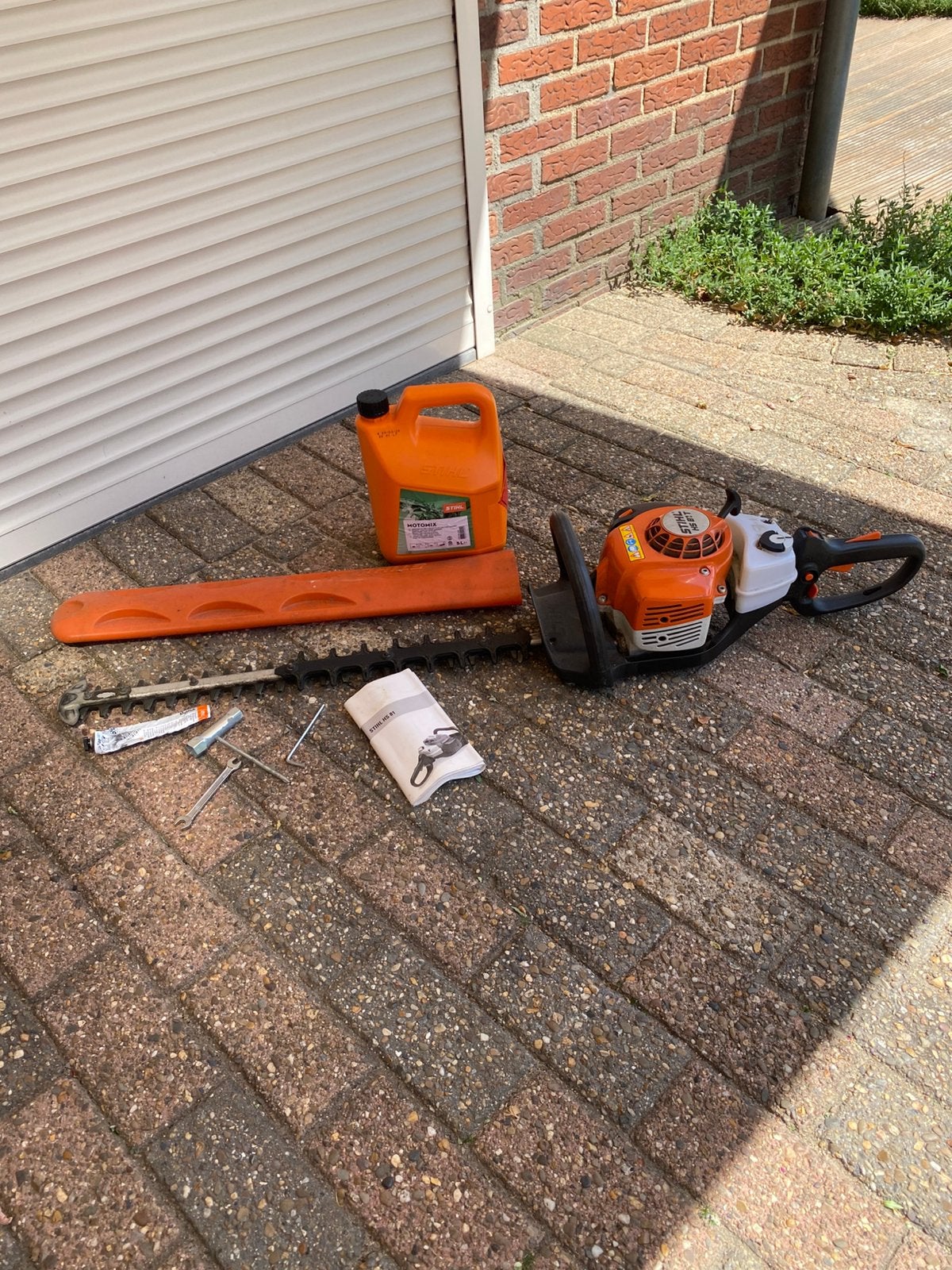 Benzine motor heggenschaar Stihl, Tuin en Terras, Heggenscharen, Ophalen, Zo goed als nieuw, Benzine