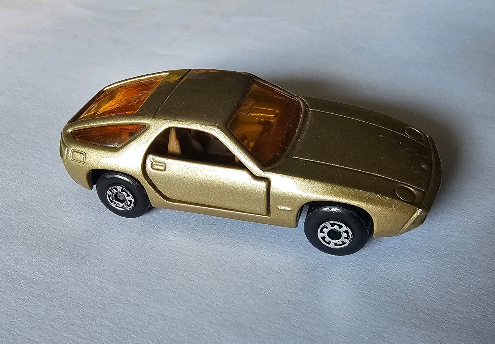 Modelauto - Matchbox Superfast Porsche 928 Goud vintage, Kinderen en Baby's, Speelgoed | Speelgoedvoertuigen, Ophalen of Verzenden