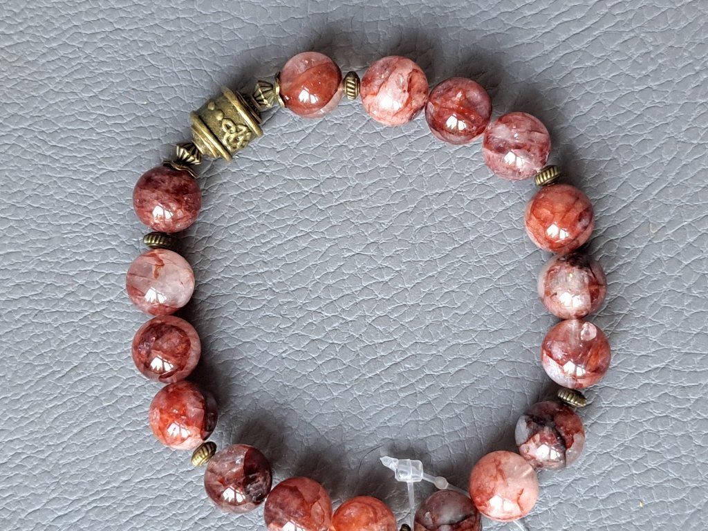 960 edelsteen armband rode fantoom kwarts 10.5mm, Nieuw, Ophalen of Verzenden, Elastiek, Met edelsteen