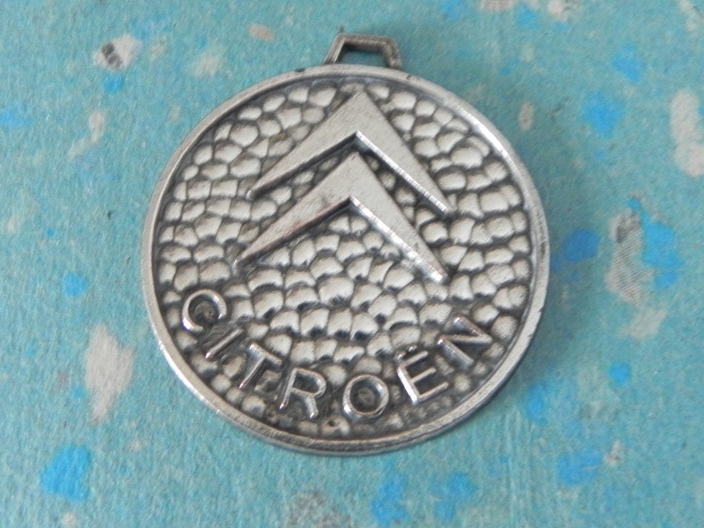Citroën medallion voor aan een sleutelhanger, Ophalen of Verzenden, Gebruikt, Transport