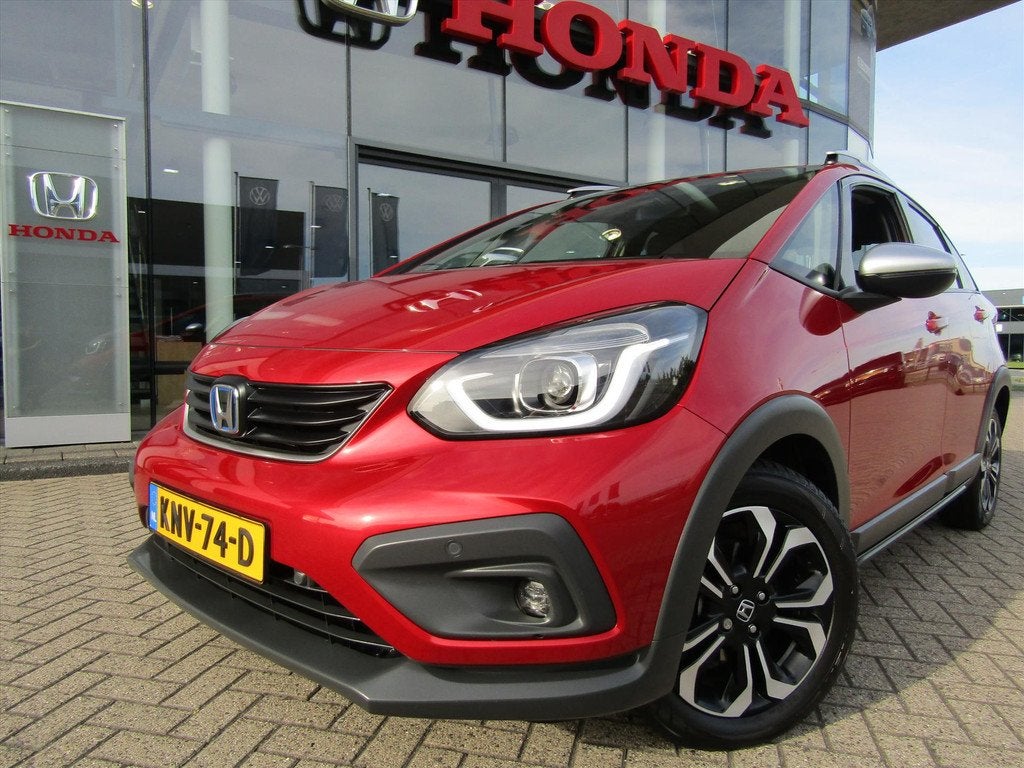 Honda Jazz 1.5 i-MMD 109pk Hybrid CVT Crosstar, Auto's, Honda, 1227 kg, Stof, 4 cilinders, 98 pk