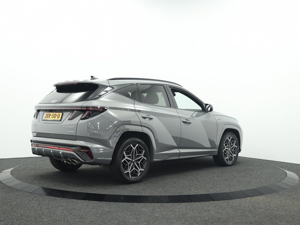 Hyundai Tucson 1.6 T-GDI HEV N Line | Navigatie | Camera | S, Auto's, Gebruikt, 4 cilinders, 1650 kg, Bedrijf