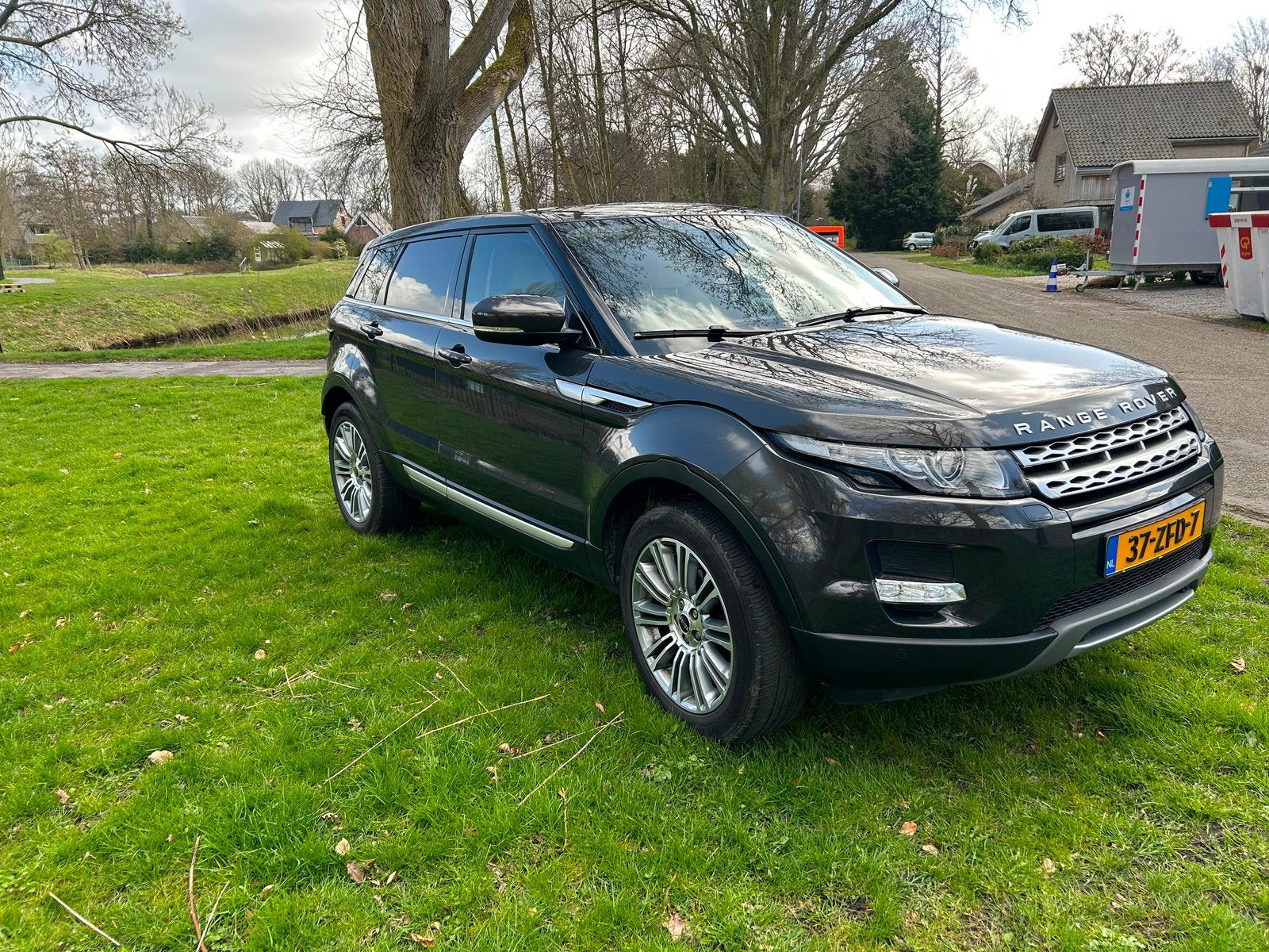 Range Rover Evoque 2.0 Benzine -DEALER ONDERHOUDEN- Panorama, Auto's, Automaat, 1800 kg, 4 cilinders, Bruin
