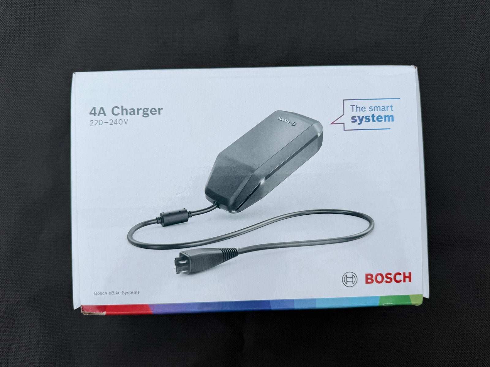 Bosch eBike Acculader 4A - Nieuw in doos, Fietsen en Brommers, Ophalen of Verzenden, Nieuw