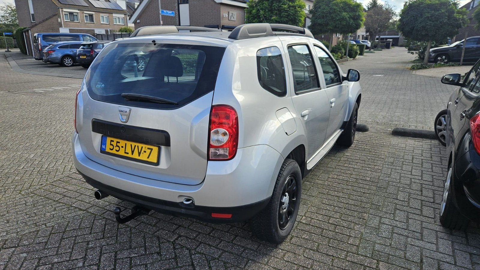 Dacia Duster 1.6 16V 4X2 2010 zilver, Auto's, Stof, Zwart, 4 cilinders, Duster