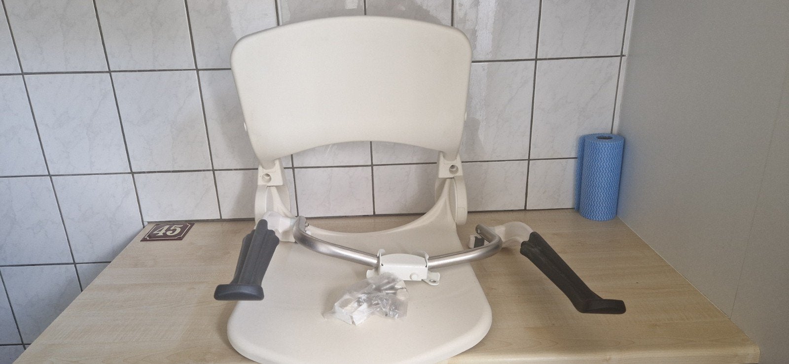 Douche stoel voor aan de wand, Ophalen