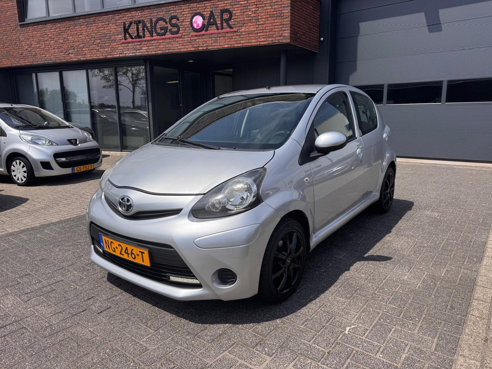 Toyota Aygo 1.0 VVT-i Dynamic Orange 5 DRS AIRCO LED NIEUWE, Voorwielaandrijving, Euro 5, Gebruikt, 4 stoelen