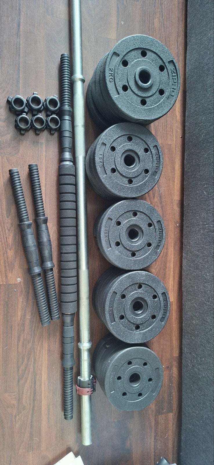 Fitness barbel en dumbels met gewichten. Nieuw!, Sport en Fitness, Ophalen