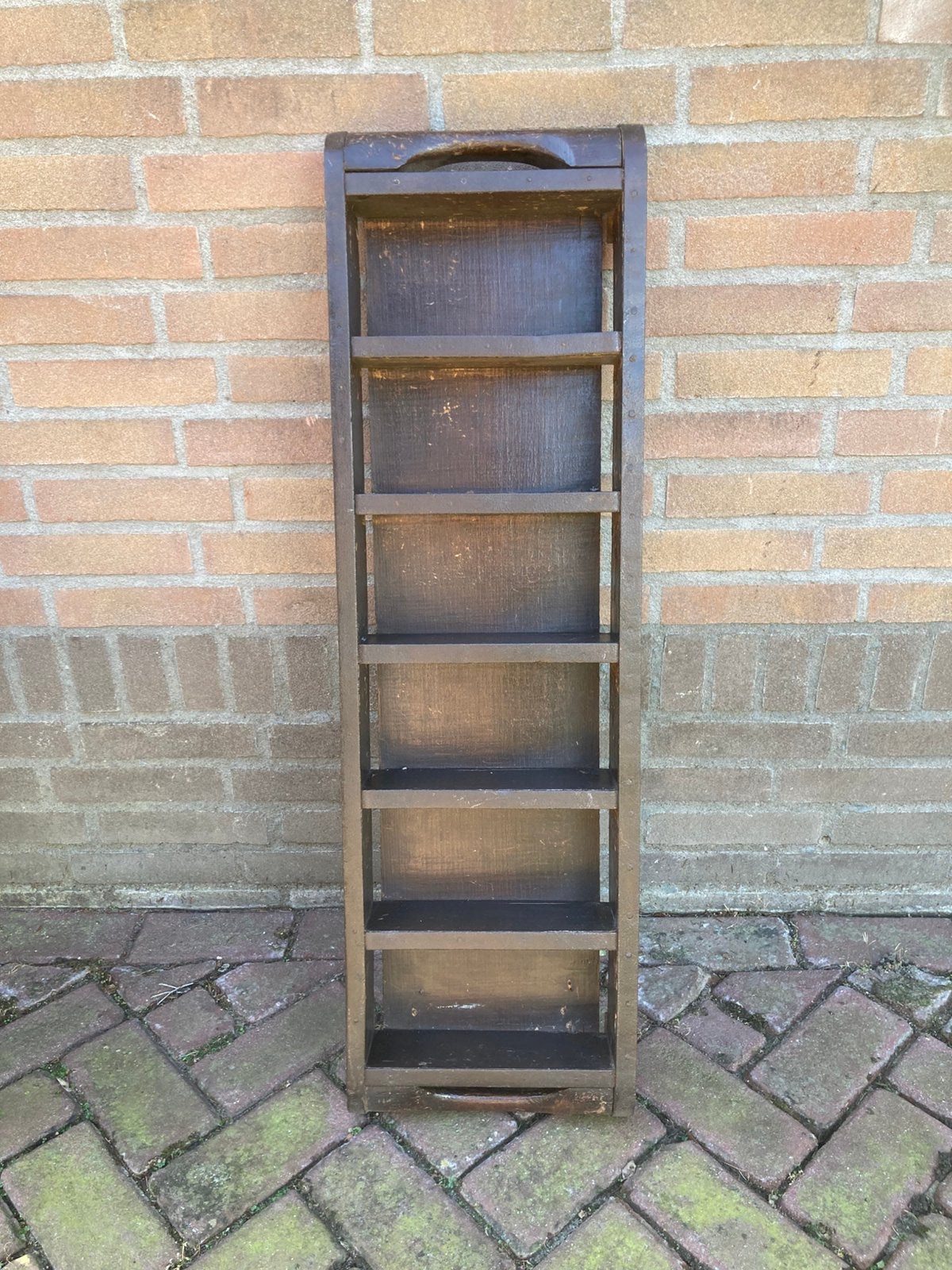 Antieke houten steenvorm, Ophalen