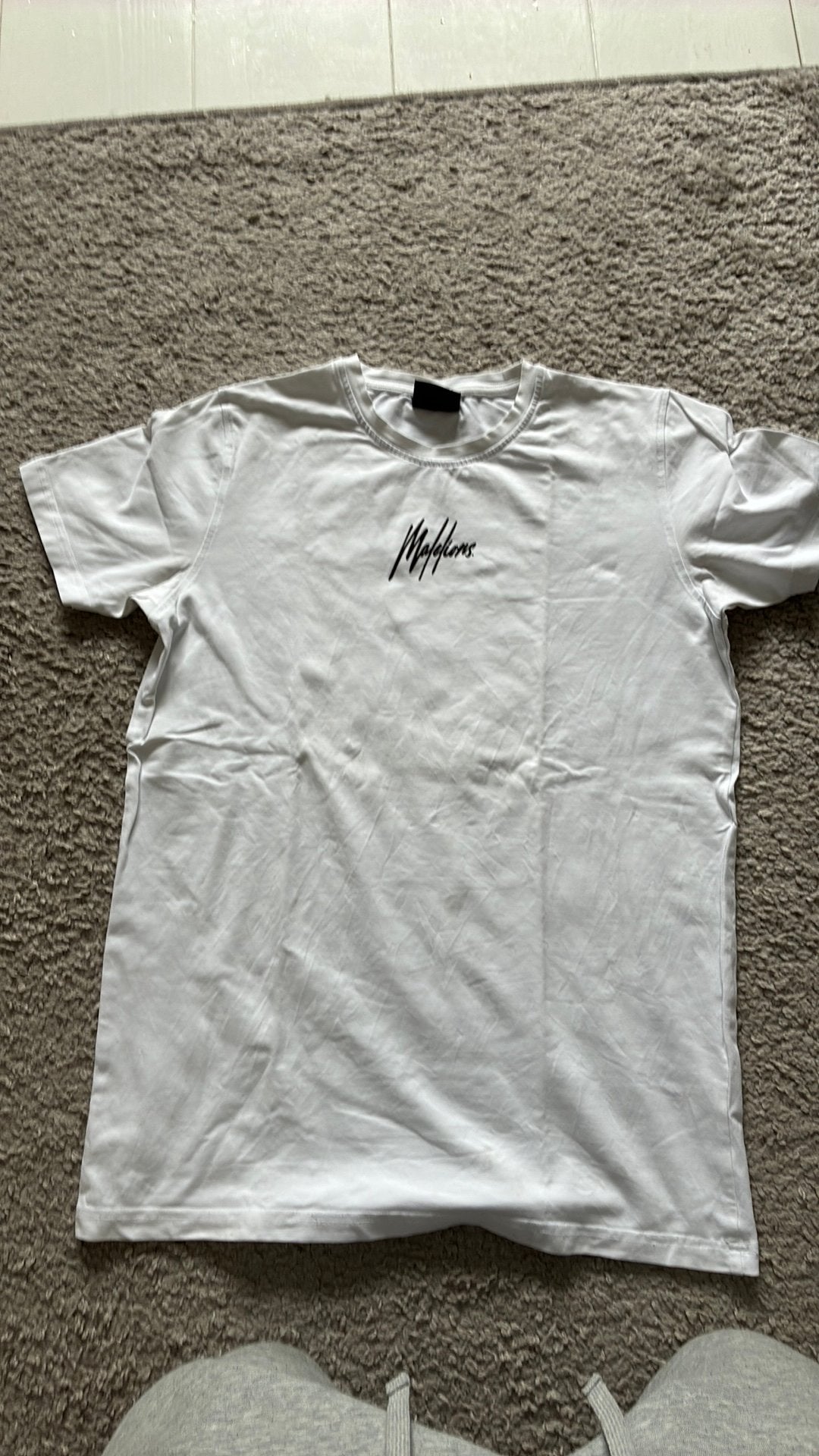 Malelions t shirt, Ophalen of Verzenden, Zo goed als nieuw, Maat 46 (S) of kleiner