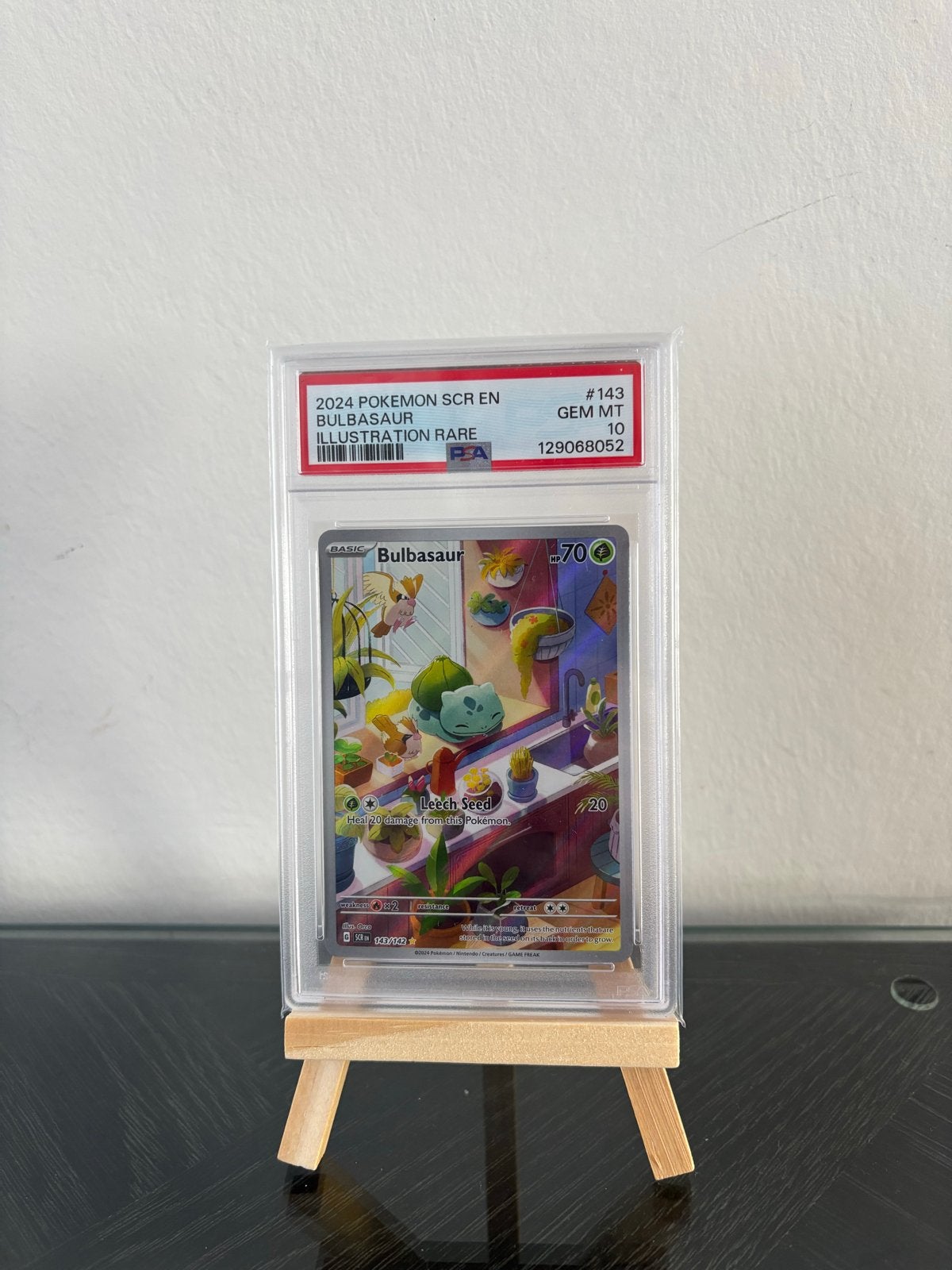 Bulbasaur PSA 10 #143, Hobby en Vrije tijd, Verzamelkaartspellen | Pokémon, Ophalen of Verzenden, Nieuw, Losse kaart