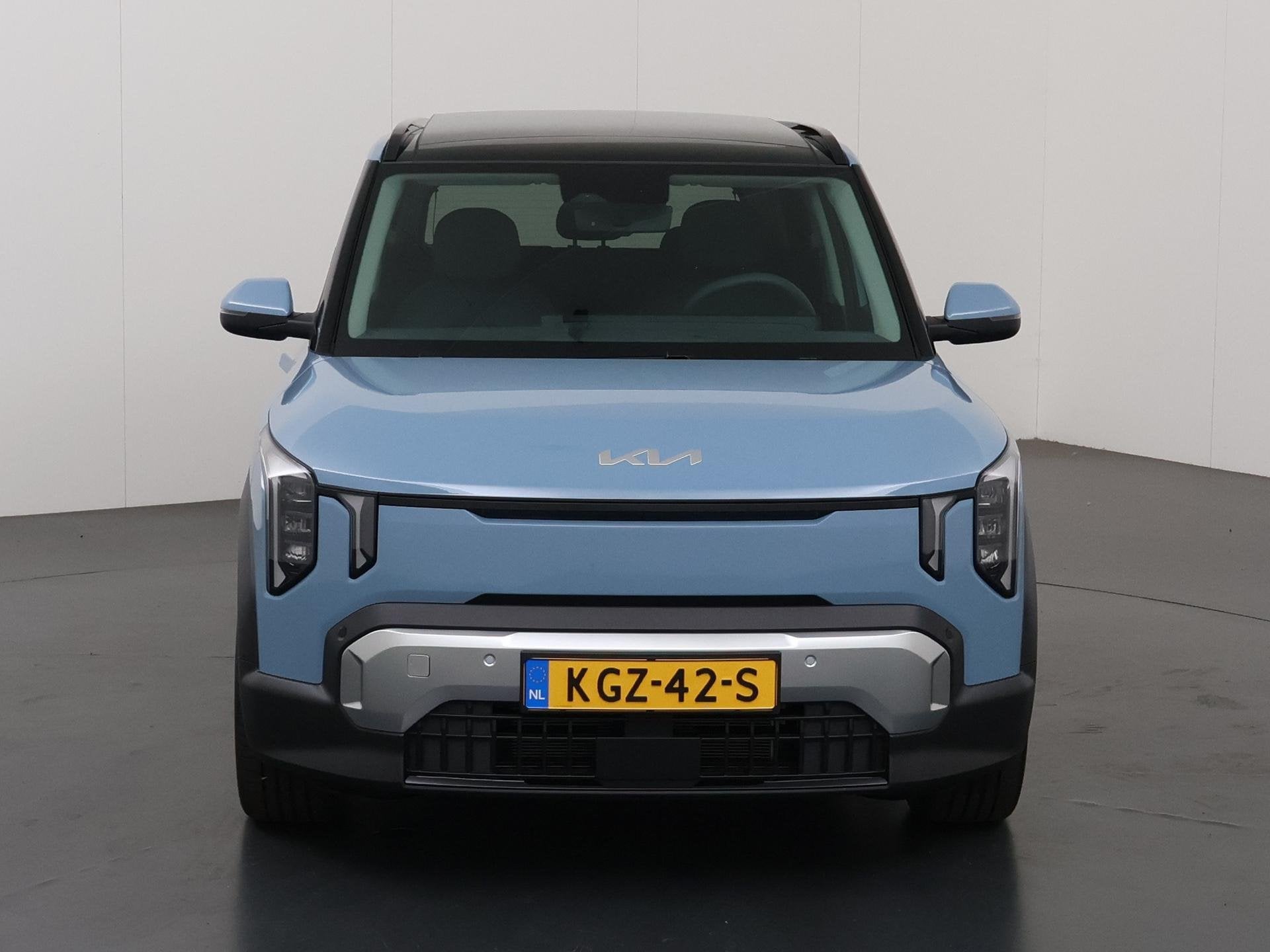 Kia EV2 Plus Advanced 42.2 kWh | Glazen schuif-/kanteldak |, Auto's, Dealer onderhouden, Stof, Blauw, Te koop