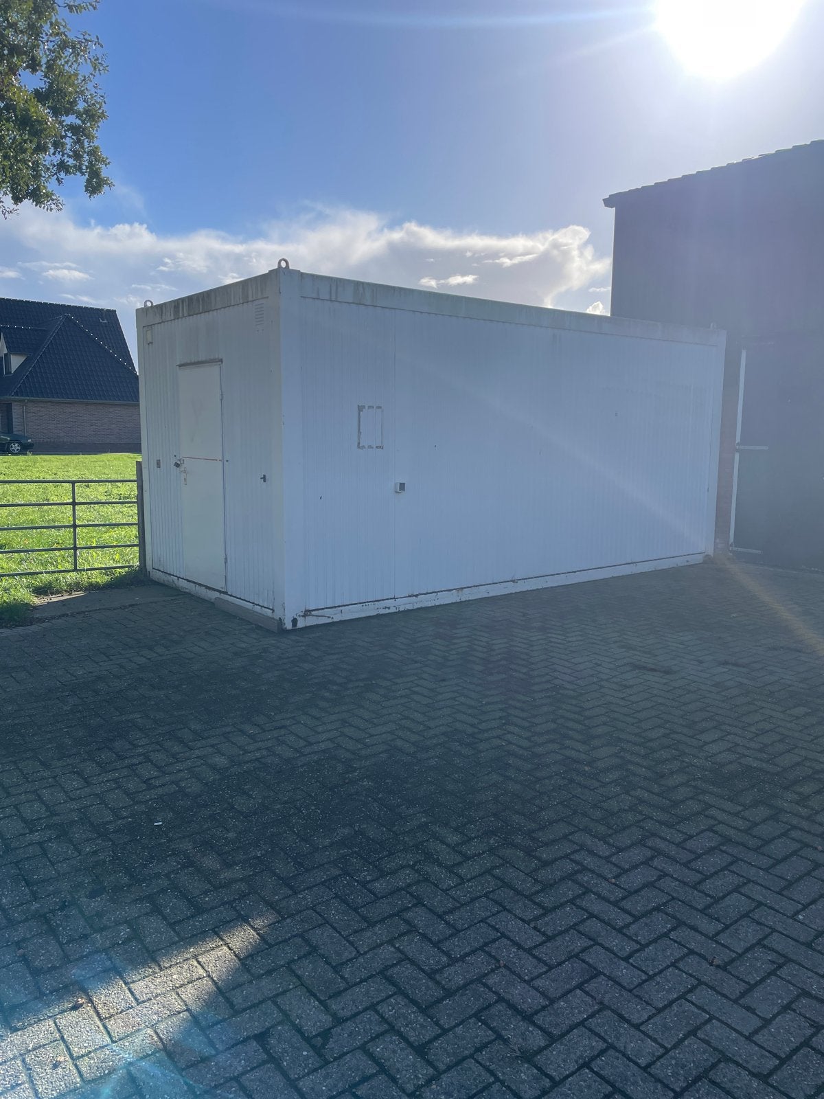 6x3m opslagcontainer met werkplaats en sanitair, Ophalen