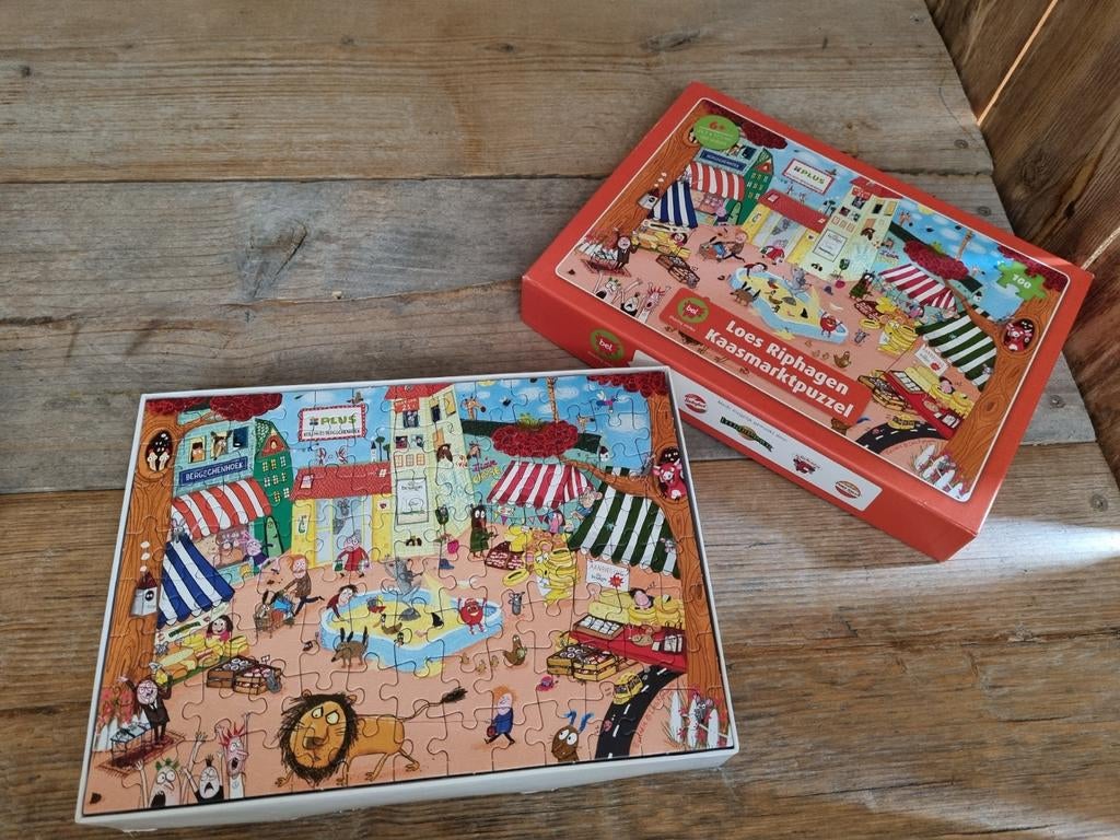 Loes Riphagen Kaasmarktpuzzel 100 stukjes, Ophalen of Verzenden, Meer dan 50 stukjes, Zo goed als nieuw, 6 jaar of ouder