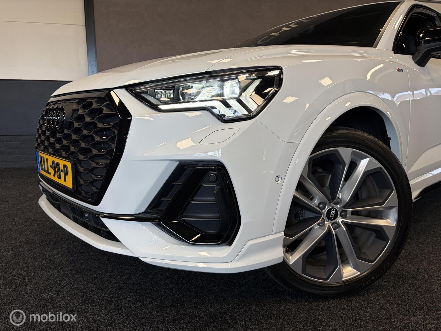 Audi Q3 Sportback 35 TFSI S Line / BLACK OPTIC / LEER / LMV, Dealer onderhouden, 15 km/l, Zwart, 4 cilinders