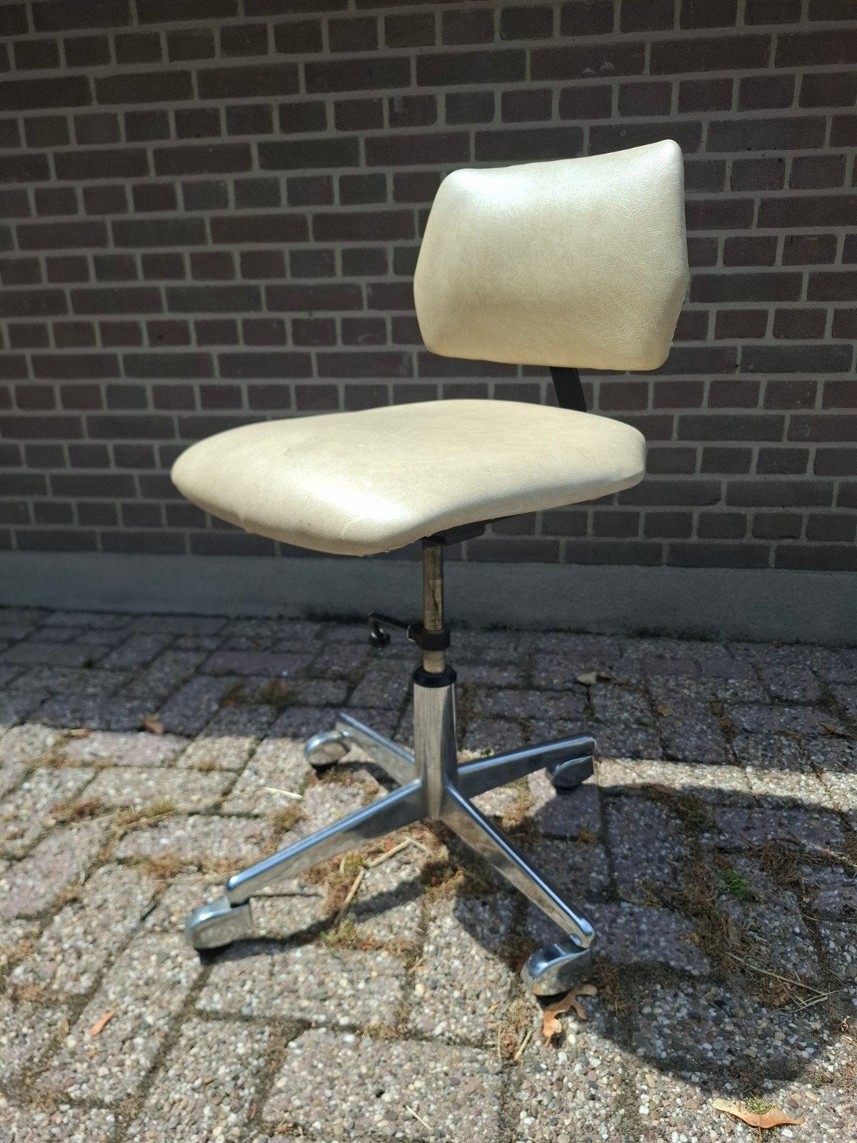 Vintage bureaustoel, Ophalen