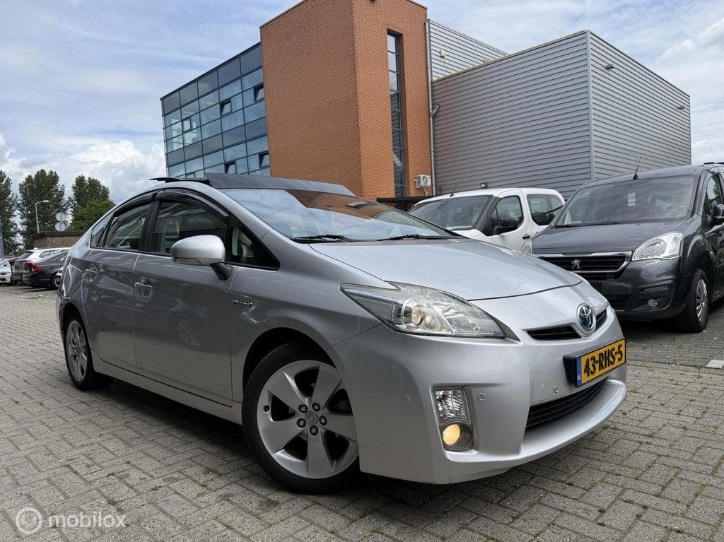 Toyota Prius 1.8 Dynamic Business BOMVOL Opties, Auto's, Toyota, Euro 5, 136 pk, Gebruikt, 4 cilinders