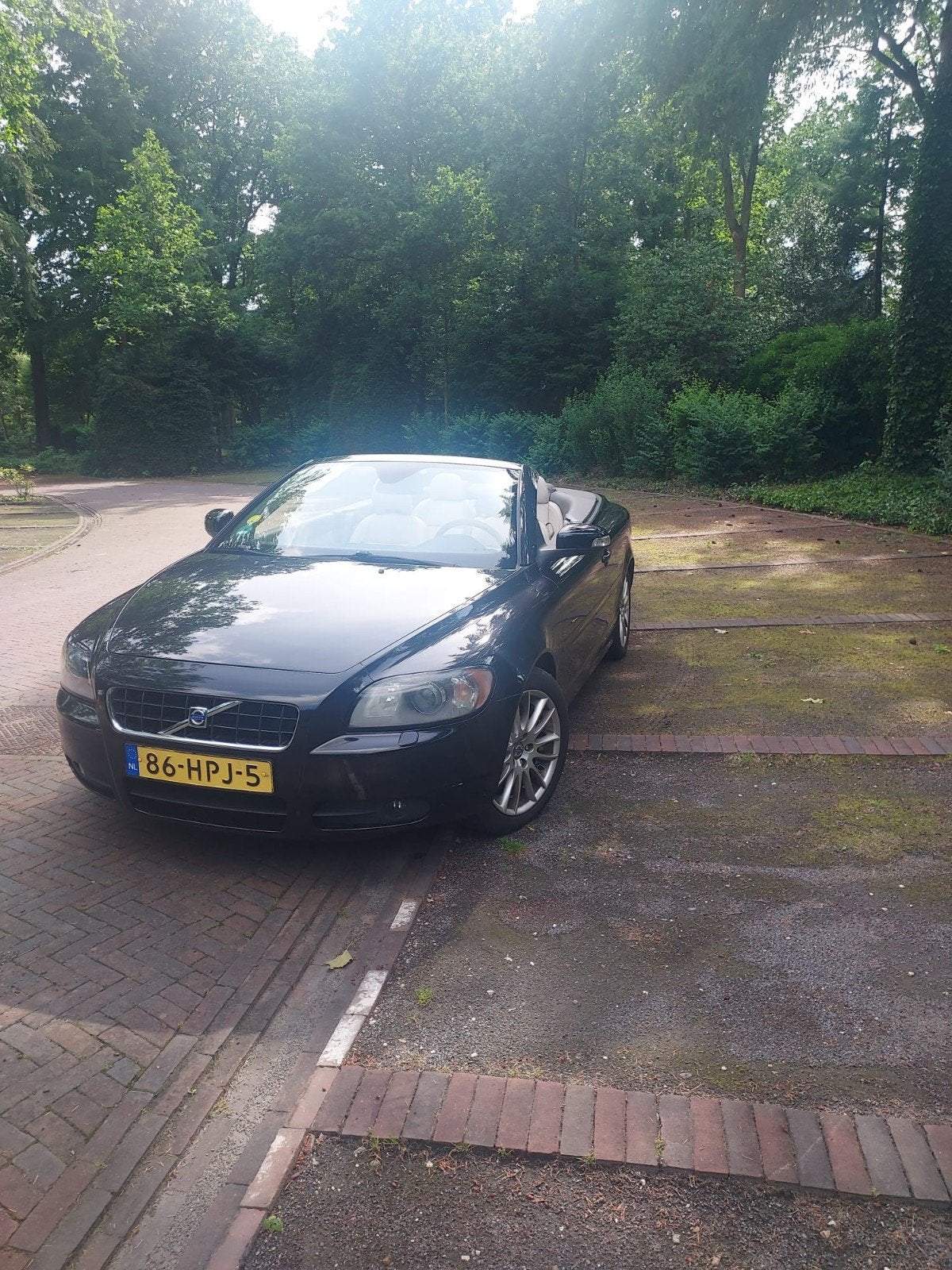 Volvo C70 2.4 170PK Geartronic 2009 Zwart, Auto's, Volvo, C70, Cabriolet, 4 stoelen, Zwart